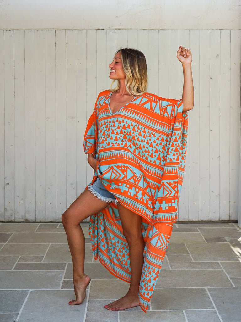 Poncho corto davanti lungo dietro rayon Lien - arancione - Bijondo